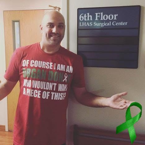 Brad D. Messner at the surgical center on donation day, wearing an organ-donor shirt